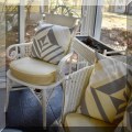 F30. White wicker plant stand and side chair. 